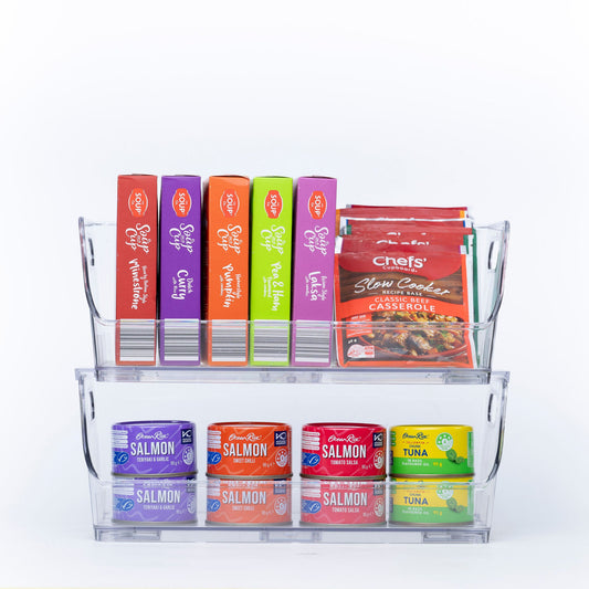 Pantry with large clear stackable organiser storing snacks