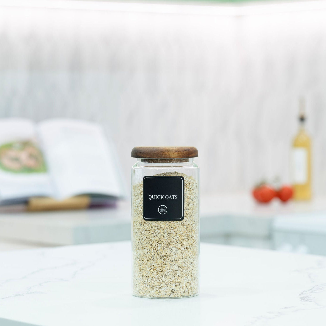 Second largest acacia wood lid glass pantry jar from the 21 piece set